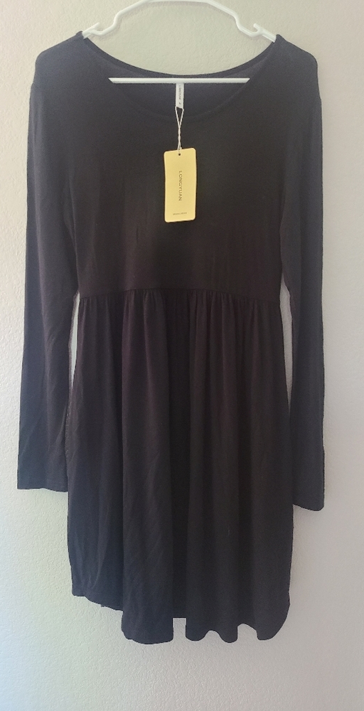 Nwt. Black long sleeve dress with pockets.  Medium